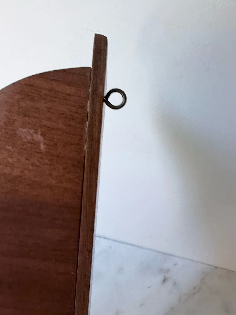 vintage wall sconce shelf made of carved wood with a dark finish